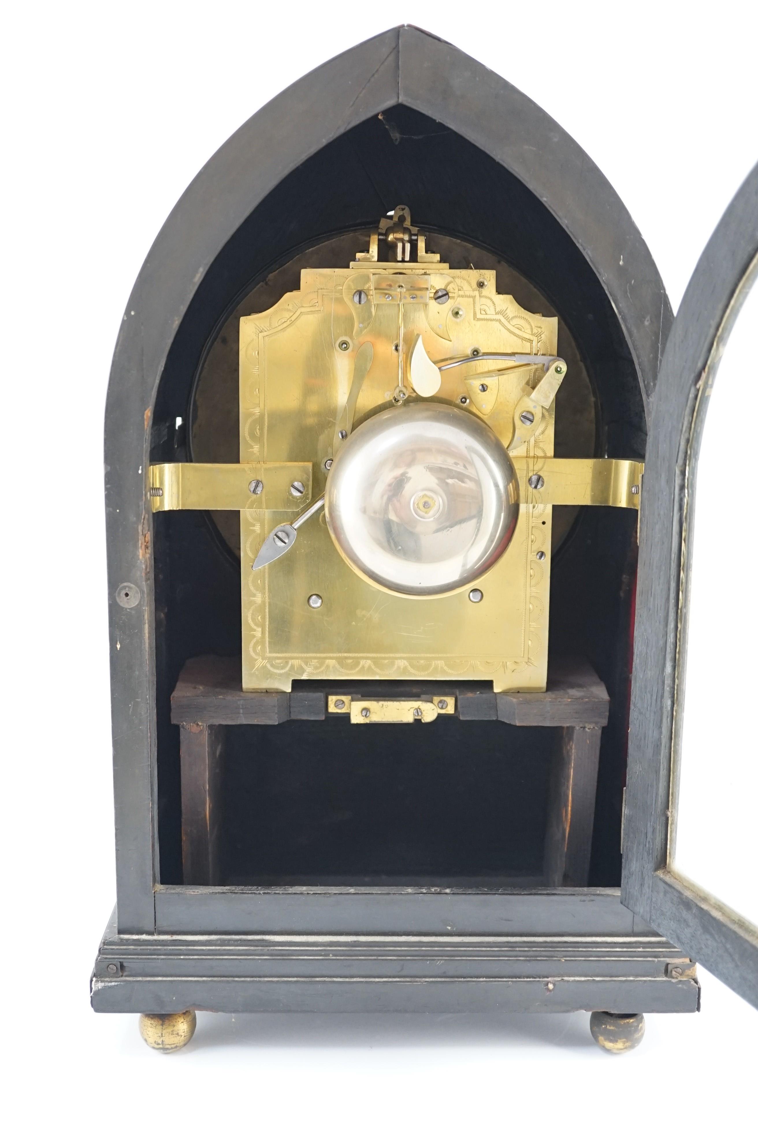 Ellicott & Taylor, Royal Exchange. A Regency lancet shaped ebonised bracket clock, 27cm wide, 15cm deep, 44cm high